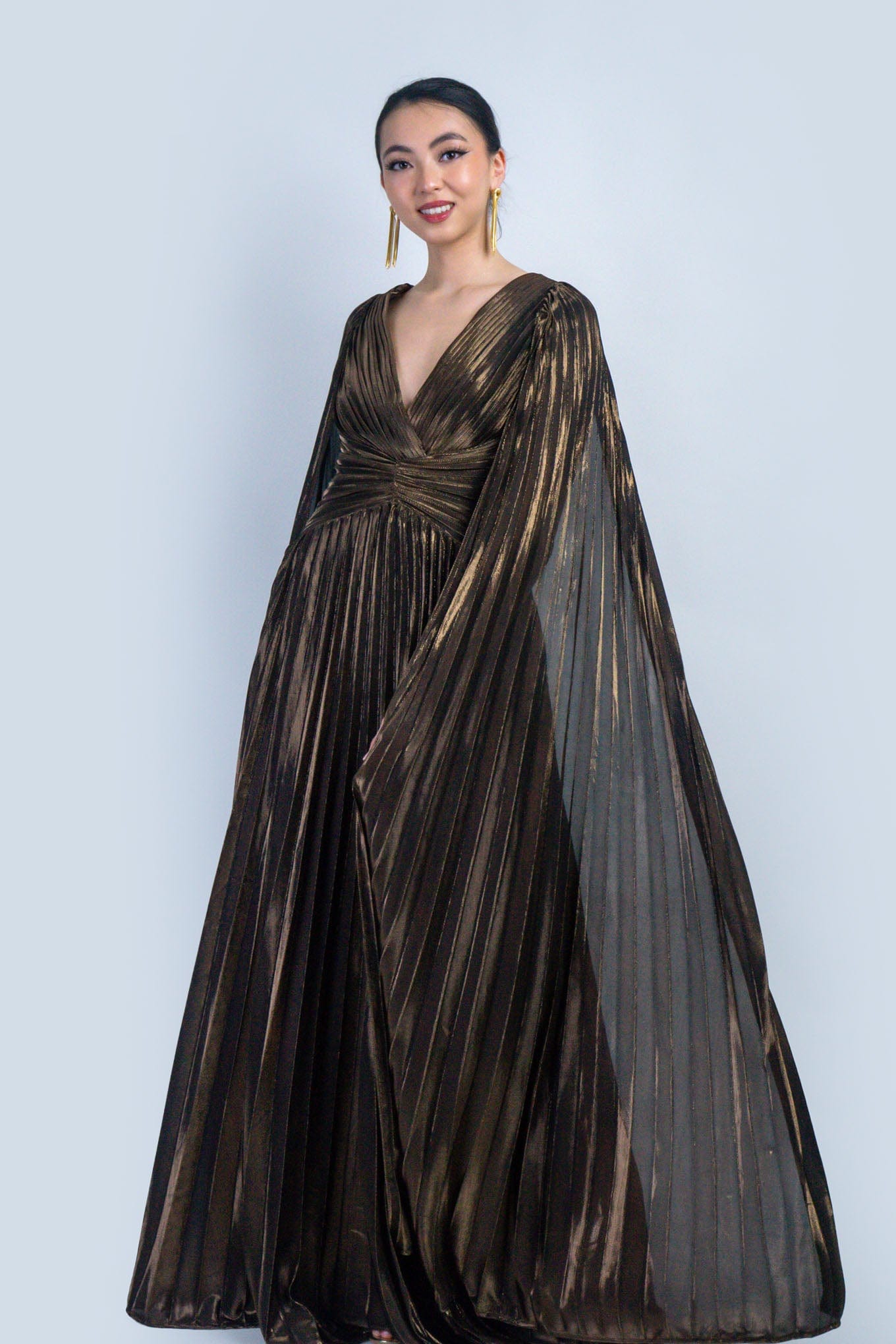 DCD DRESSES Bronze V-Neck Cape Sleeves Pleated Gown